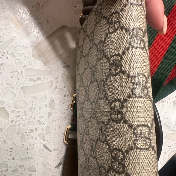Gucci Beige and Brown Crossbody Bag with Gold Accents
Like new condition - Picture 3 of 3